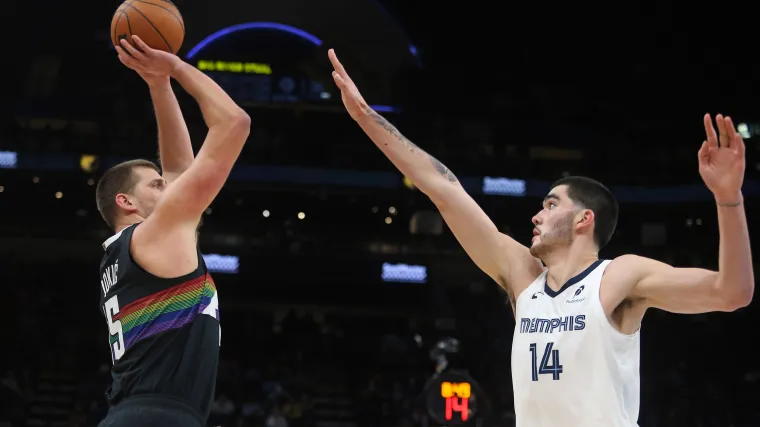 Nuggets' Nikola Jokic made a pass so crazy the Grizzlies' bench couldn't hide their reactions image