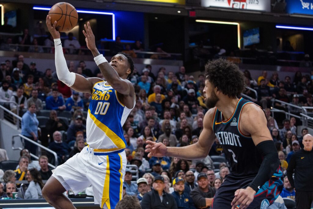 Nov 24, 2025; Indianapolis, Indiana, USA; Indiana Pacers guard Bennedict Mathurin (00) shoots the ball while Detroit Pistons guard Cade Cunningham (2) defends in the first half at Gainbridge Fieldhouse. Mandatory Credit: Trevor Ruszkowski-Imagn Images