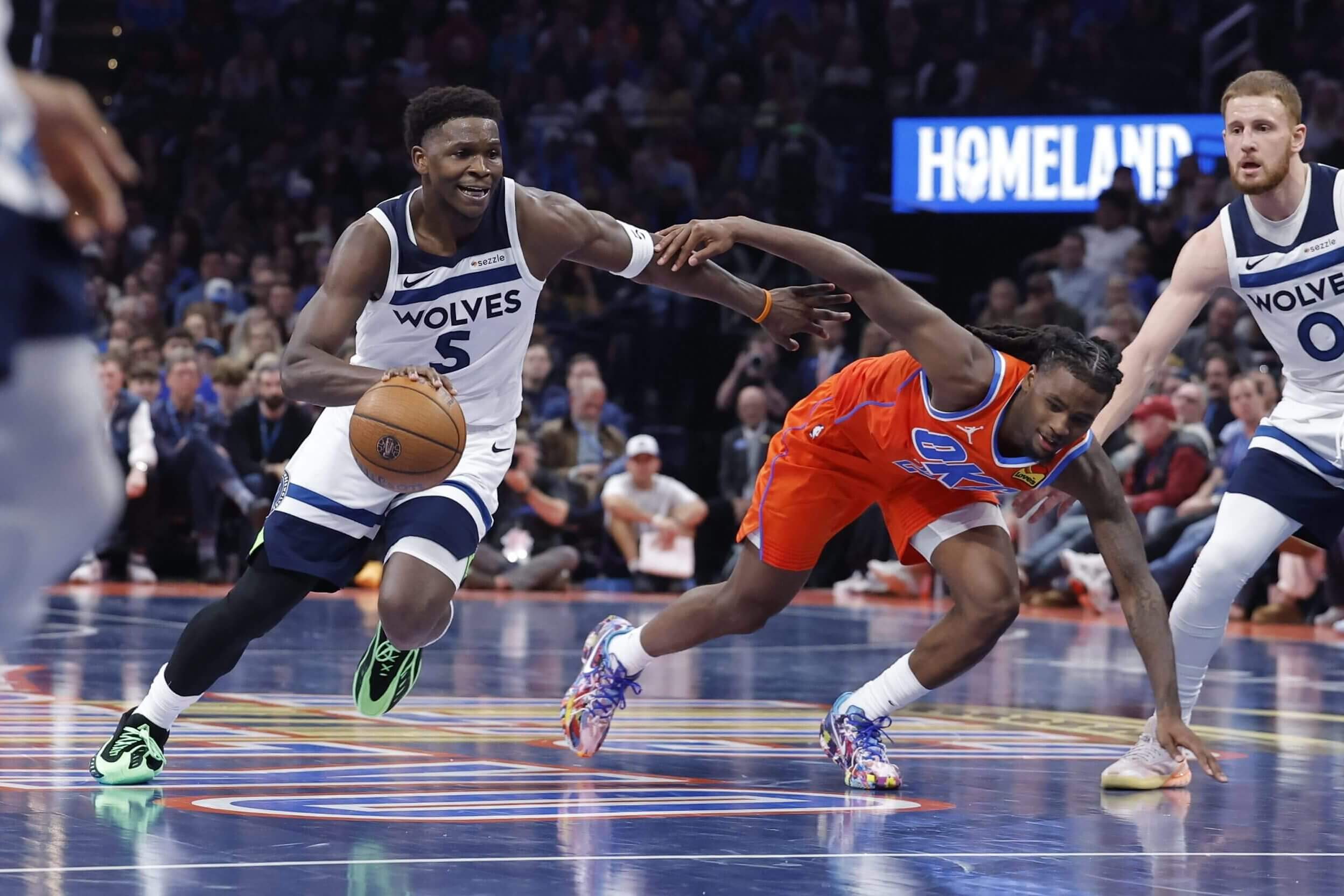 Anthony Edwards dribbles vs. the Thunder.