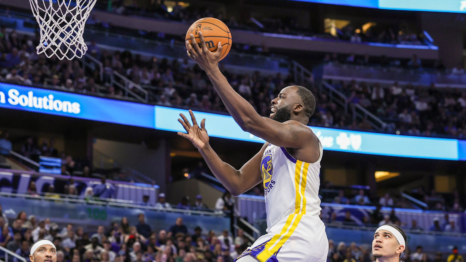 Golden State Warriors forward Draymond Green (23) goes to the basket during the second half against the Orlando Magic at Kia Center.