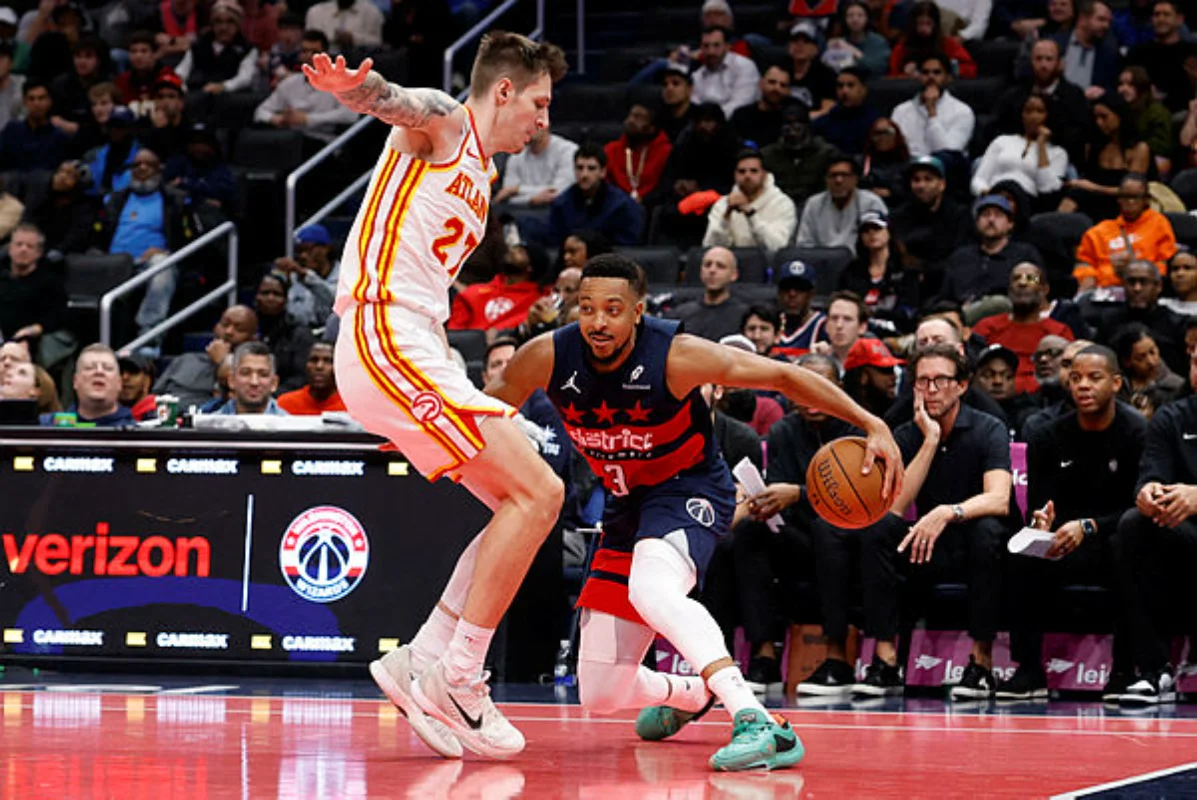 Wizards snap 14-game losing streak as Magic set scoring record