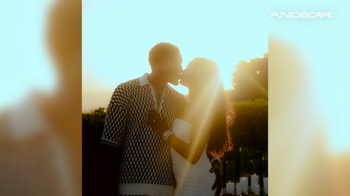 Donovan Mitchell shares a kiss with fiancée Coco Jones in the sun.