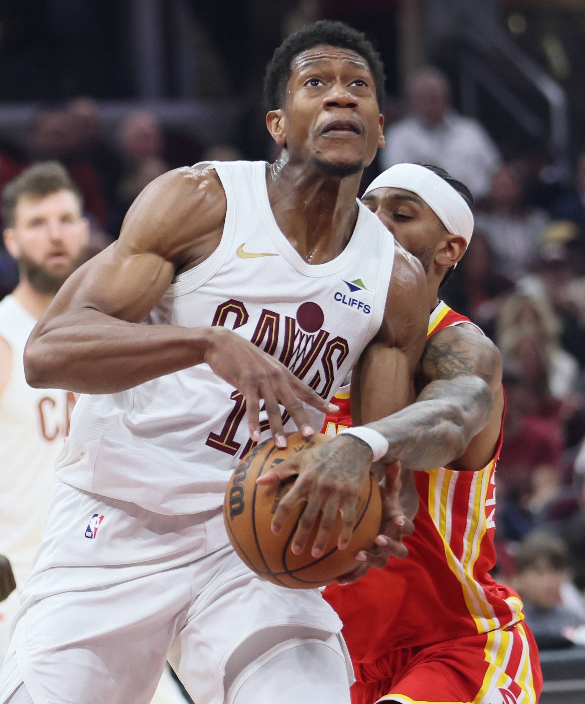 Atlanta Hawks guard Nickeil Alexander-Walker strips the basketball from the hands of Cleveland Cavaliers forward De'Andre Hunter in the first half at Rocket Arena. 