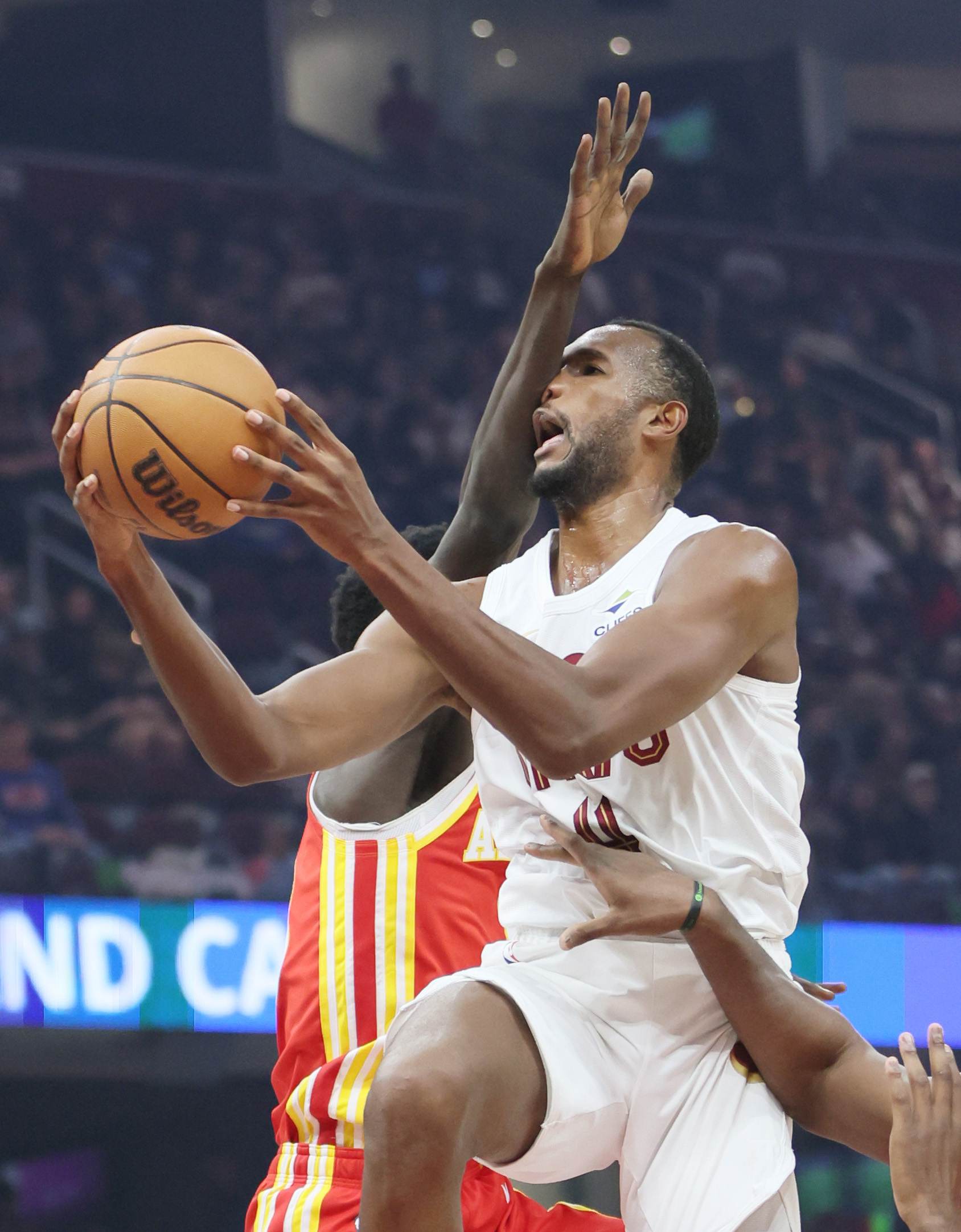 Cleveland Cavaliers center Evan Mobley is hit in the face by the arm of Atlanta Hawks forward Jalen Johnson on a drive to the basket in the first half at Rocket Arena. 