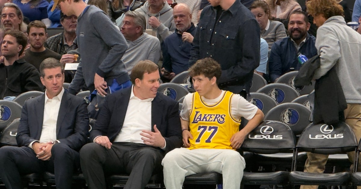 Mavericks fan in Luka Doncic Lakers jersey has courtside conversation with Patrick Dumont