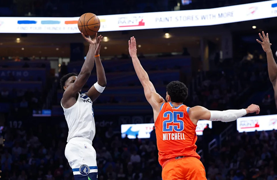 Nov 26, 2025; Oklahoma City, Oklahoma, USA; Minnesota Timberwolves guard Anthony Edwards (5) shoots over Oklahoma City Thunder guard Ajay Mitchell (25) during the second half at Paycom Center. Mandatory Credit: Alonzo Adams-Imagn Images