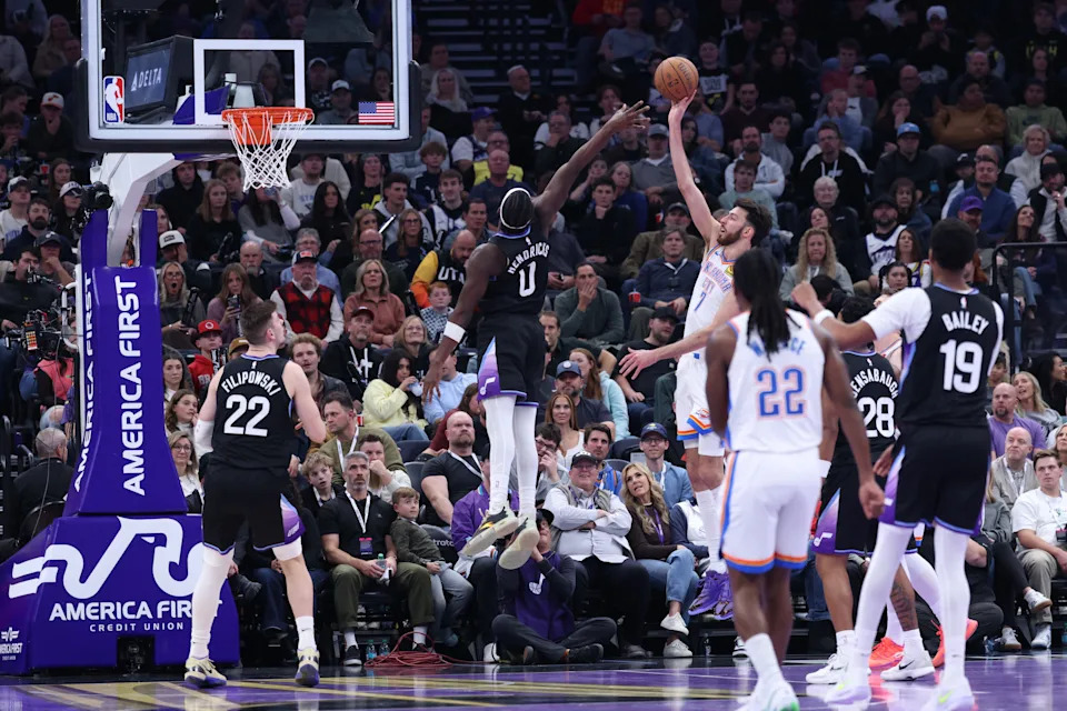 Nov 21, 2025; Salt Lake City, Utah, USA; Oklahoma City Thunder center Chet Holmgren (7) shoots over Utah Jazz forward Taylor Hendricks (0) during the second half at Delta Center. Mandatory Credit: Rob Gray-Imagn Images
