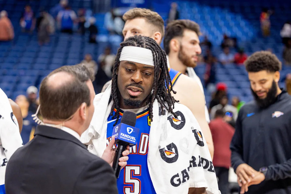 Nov 17, 2025; New Orleans, Louisiana, USA; Oklahoma City Thunder guard Luguentz Dort (5) talks to the media after the win against the New Orleans Pelicans at Smoothie King Center. Mandatory Credit: Stephen Lew-Imagn Images