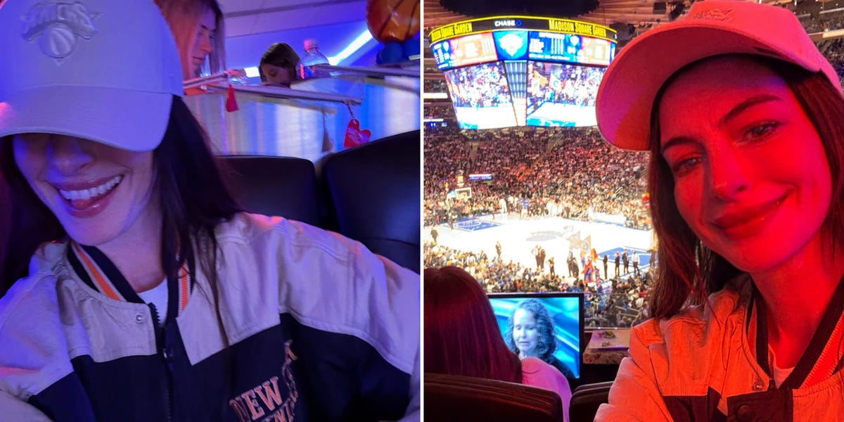 Anne Hathaway Watches a Knicks Game in Head-to-Toe Merch