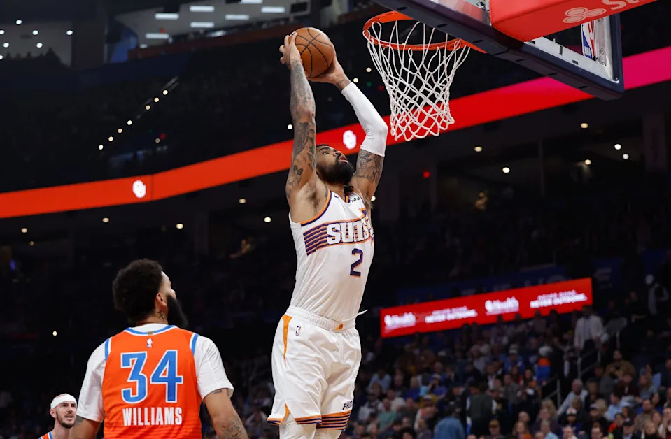 Nov 28, 2025; Oklahoma City, Oklahoma, USA; Phoenix Suns center Nick Richards (2) goes up for a dunk against the Oklahoma City Thunder during the second quarter at Paycom Center. Mandatory Credit: Alonzo Adams-Imagn Images