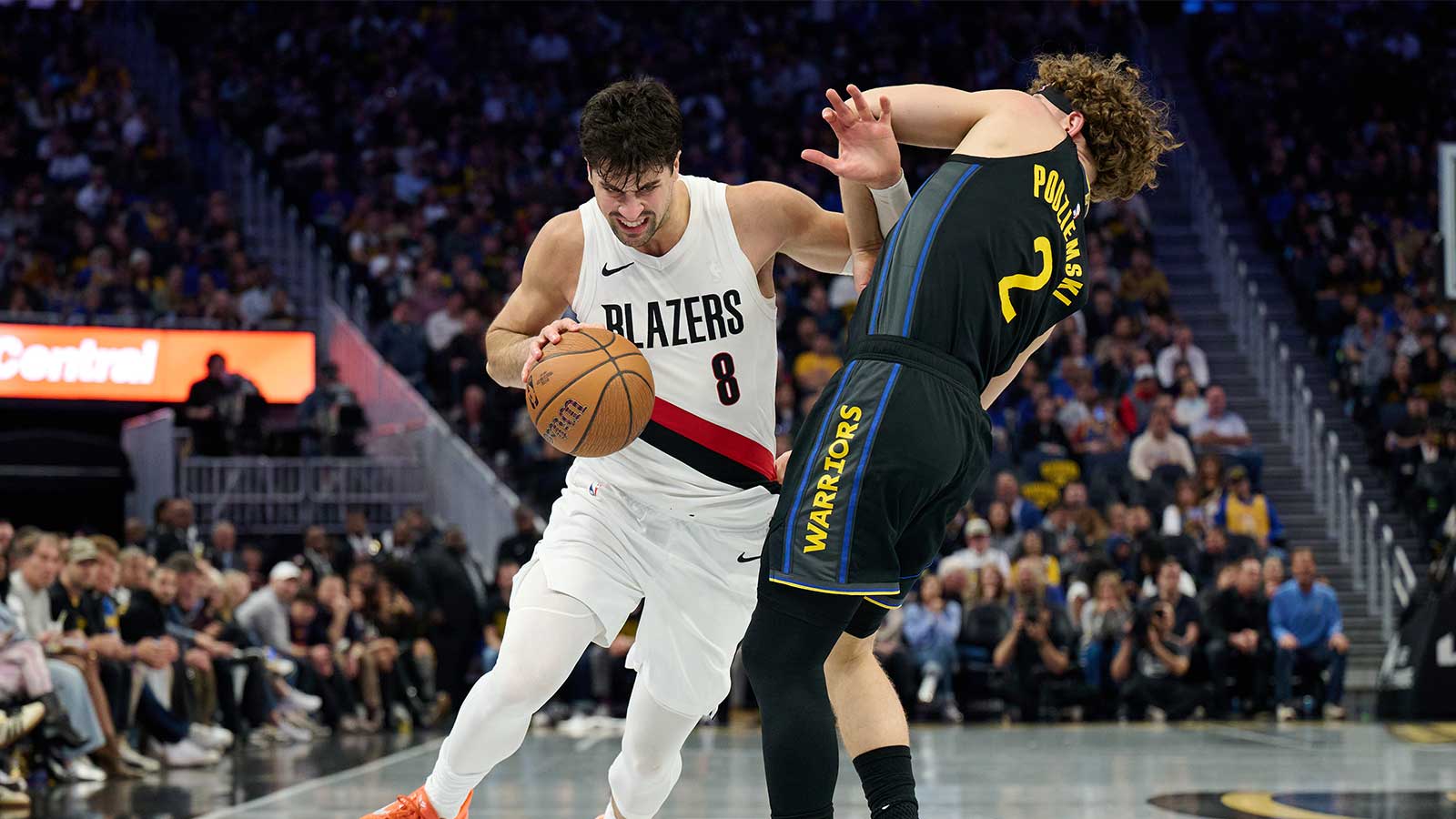  Portland Trail Blazers forward Deni Avdija (8) drives with the ball against Golden State Warriors guard Brandin Podziemski (2) during the first quarter at Chase Center.