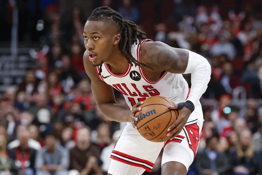 Oct 27, 2025; Chicago, Illinois, USA; Chicago Bulls guard Ayo Dosunmu (11) looks to pass the ball against the Atlanta Hawks during the first half at United Center. Mandatory Credit: Kamil Krzaczynski-Imagn Images