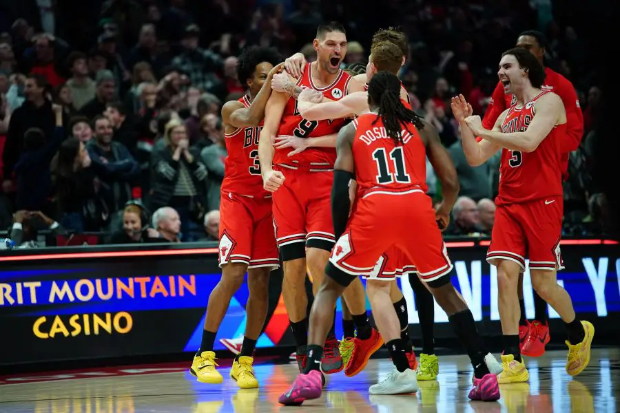 Nov 19, 2025; Portland, Oregon, USA; Chicago Bulls center Nikola Vucevic (9) celebrates with teammates after the game winning buzzer beater three point basket against the Portland Trail Blazers at Moda Center. Mandatory Credit: Soobum Im-Imagn Images