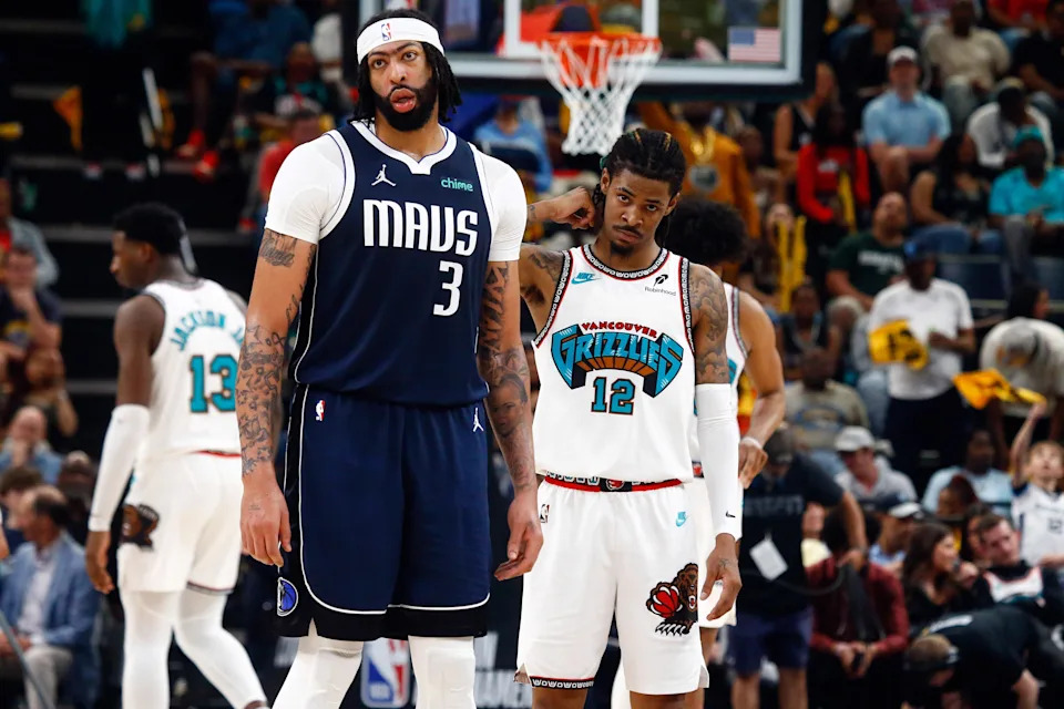 Dallas Mavericks forward Anthony Davis (3) and Memphis Grizzlies guard Ja Morant (12) look on during the third quarter at FedExForum on April 18, 2025. Petre Thomas-Imagn Images