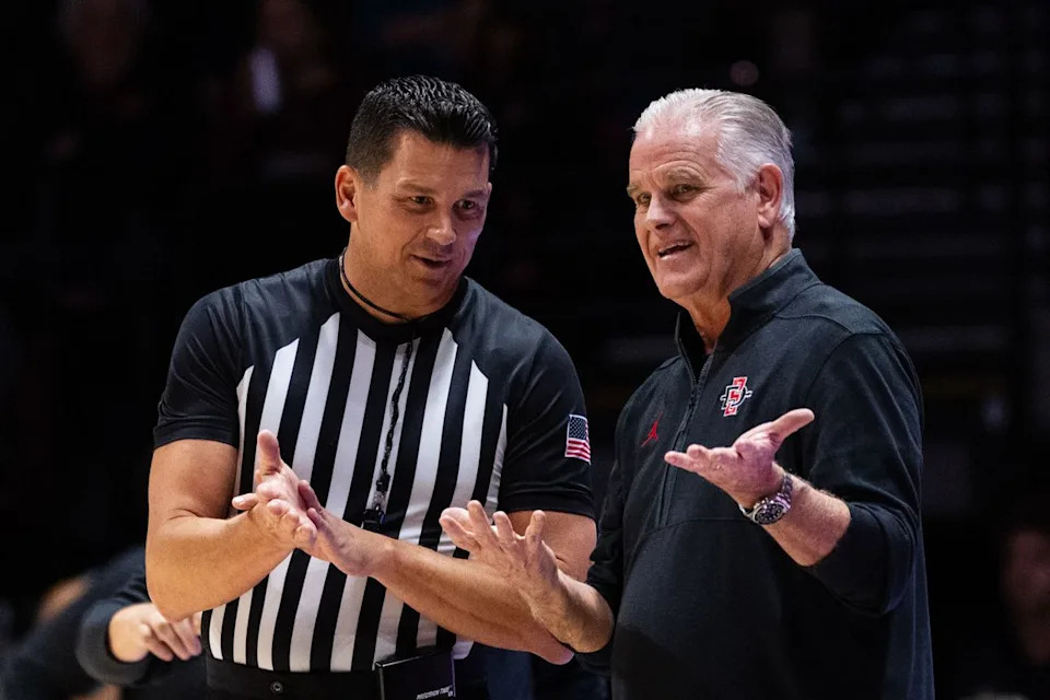 San Diego State Head Coach Brian Dutcher argues with an official during an NCAA Basketball game against Troy, Tuesday November 18, 2025 at Viejas Arena in San Diego, Calif.