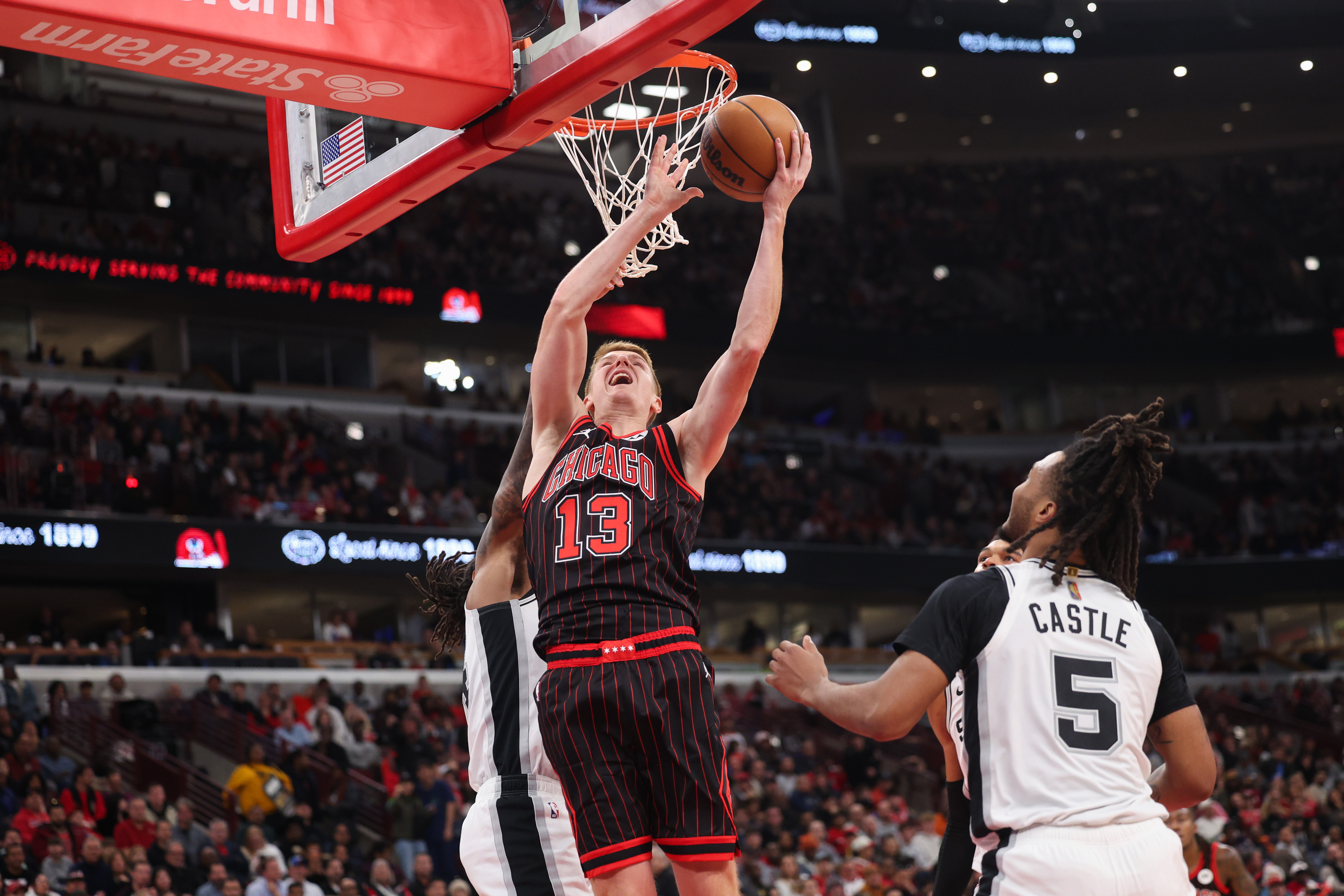 Chicago Bulls guard Kevin Huerter (13) goes up for a basket during the second quarter against the San Antonio Spurs at the United Center on Monday, Nov. 10, 2025, in Chicago. (Armando L. Sanchez/Chicago Tribune)