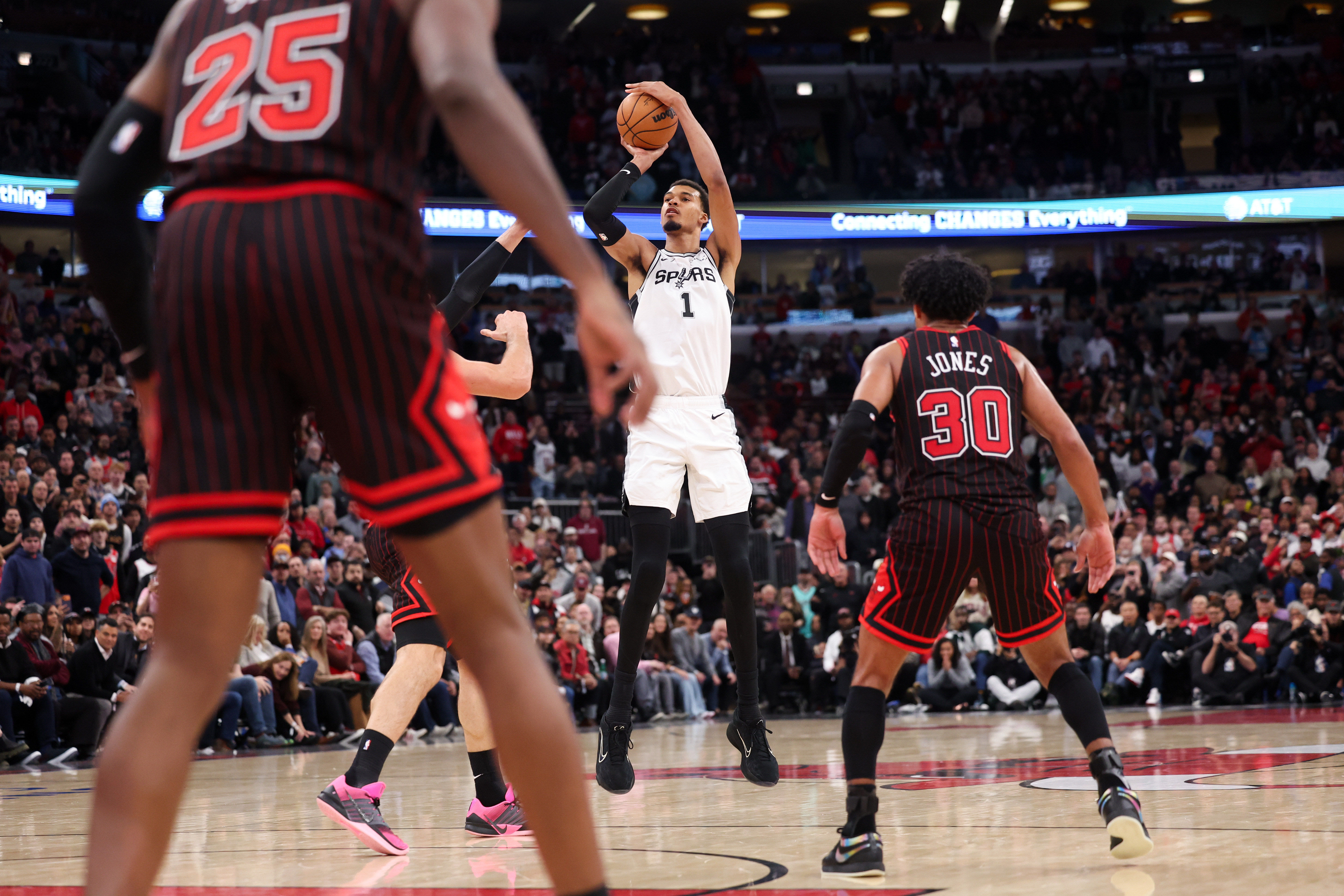 San Antonio Spurs forward Victor Wembanyama (1) makes a 3-point shot to make it, 117-114, during the fourth quarter against the Chicago Bulls at the United Center on Monday, Nov. 10, 2025, in Chicago. (Armando L. Sanchez/Chicago Tribune)