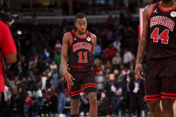 Bulls guard Ayo Dosunmu walks off the court after a 121-117 loss to the Spurs on Monday, Nov. 10, 2025, at the United Center. (Armando L. Sanchez/Chicago Tribune)