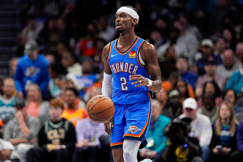 Nov 15, 2025; Charlotte, North Carolina, USA; Oklahoma City Thunder guard Shai Gilgeous-Alexander (2) brings the ball up court against the Charlotte Hornets during the second half at Spectrum Center. Mandatory Credit: Jim Dedmon-Imagn Images