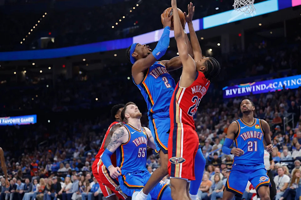 Nov 2, 2025; Oklahoma City, Oklahoma, USA; Oklahoma City Thunder guard Shai Gilgeous-Alexander (2) goes up for a basket against New Orleans Pelicans forward Trey Murphy III (25) during the second quarter at Paycom Center. Mandatory Credit: Alonzo Adams-Imagn Images