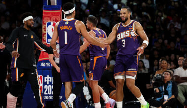 Dillon Brooks #3 of Phoenix Suns celebrates with Devin Booker #1 during NBA China Games 2025 betwee...