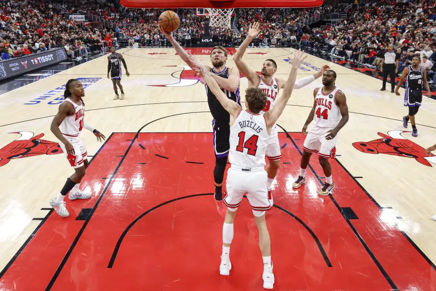Oct 29, 2025; Chicago, Illinois, USA; Sacramento Kings forward Domantas Sabonis (11) goes to the basket against the Chicago Bulls during the first half at United Center. Mandatory Credit: Kamil Krzaczynski-Imagn Images