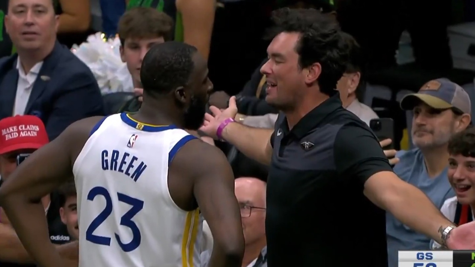 Draymond Green confronts a Pelicans fan during game
