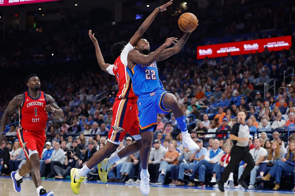 Nov 2, 2025; Oklahoma City, Oklahoma, USA; Oklahoma City Thunder guard Cason Wallace (22) goes up for a basket against the New Orleans Pelicans during the second quarter at Paycom Center. Mandatory Credit: Alonzo Adams-Imagn Images