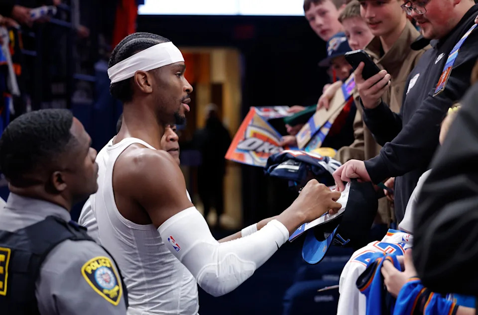 Nov 28, 2025; Oklahoma City, Oklahoma, USA; Oklahoma City Thunder guard Shai Gilgeous-Alexander interacts with fans before the start of a game against the Phoenix Suns at Paycom Center. Mandatory Credit: Alonzo Adams-Imagn Images