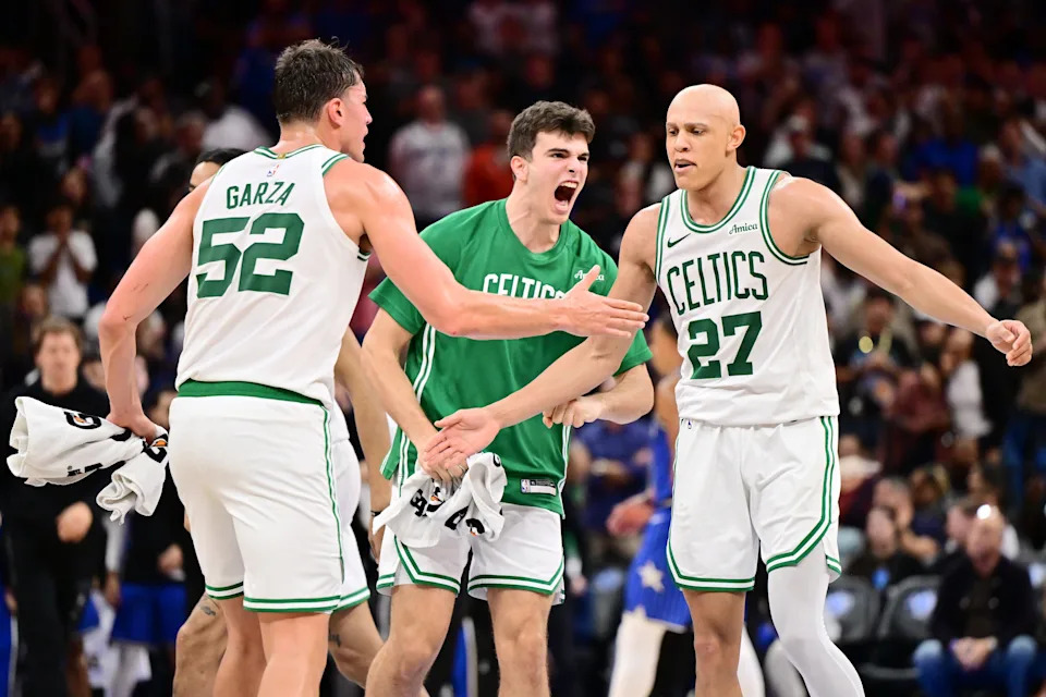 ORLANDO, FLORIDA - NOVEMBER 09: Jordan Walsh #27 of the Boston Celtics celebrates scoring a three-point-basket with Luka Garza #52 and Hugo Gonzalez #28 in the second half against the Orlando Magic at Kia Center on November 09, 2025 in Orlando, Florida. NOTE TO USER: User expressly acknowledges and agrees that, by downloading and or using this photograph, User is consenting to the terms and conditions of the Getty Images License Agreement. (Photo by Julio Aguilar/Getty Images)