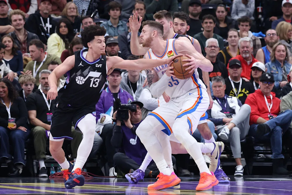 Nov 21, 2025; Salt Lake City, Utah, USA; Utah Jazz guard Walter Clayton Jr. (13) knocks the ball away from Oklahoma City Thunder center Isaiah Hartenstein (55) during the second half at Delta Center. Mandatory Credit: Rob Gray-Imagn Images