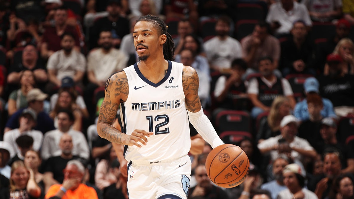 Ja Morant dribbles a basketball