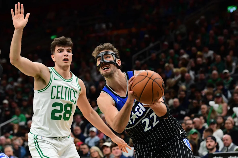 Nov 23, 2025; Boston, Massachusetts, USA; Orlando Magic forward Franz Wagner (22) drives to the basket while Boston Celtics guard Hugo Gonzalez (28) defends during the first half at TD Garden. Mandatory Credit: Bob DeChiara-Imagn Images
