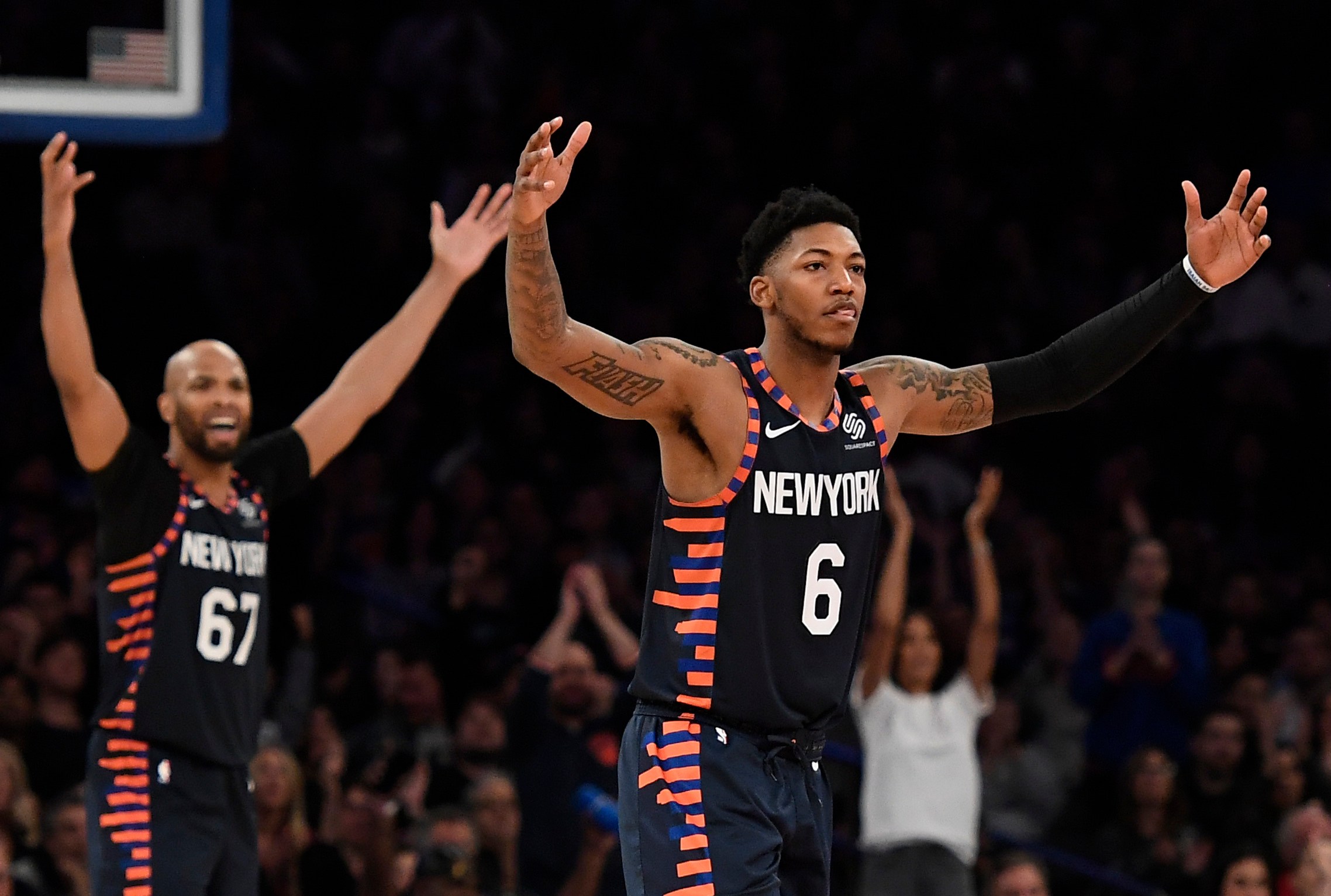 NEW YORK, NEW YORK - JANUARY 12: Elfrid Payton #6 and Taj Gibson #67 of the New York Knicks react during the second half of the game against the Miami Heat at Madison Square Garden on January 12, 2020 in New York City. NOTE TO USER: User expressly acknowledges and agrees that, by downloading and or using this photograph, User is consenting to the terms and conditions of the Getty Images License Agreement. (Photo by Sarah Stier/Getty Images)
