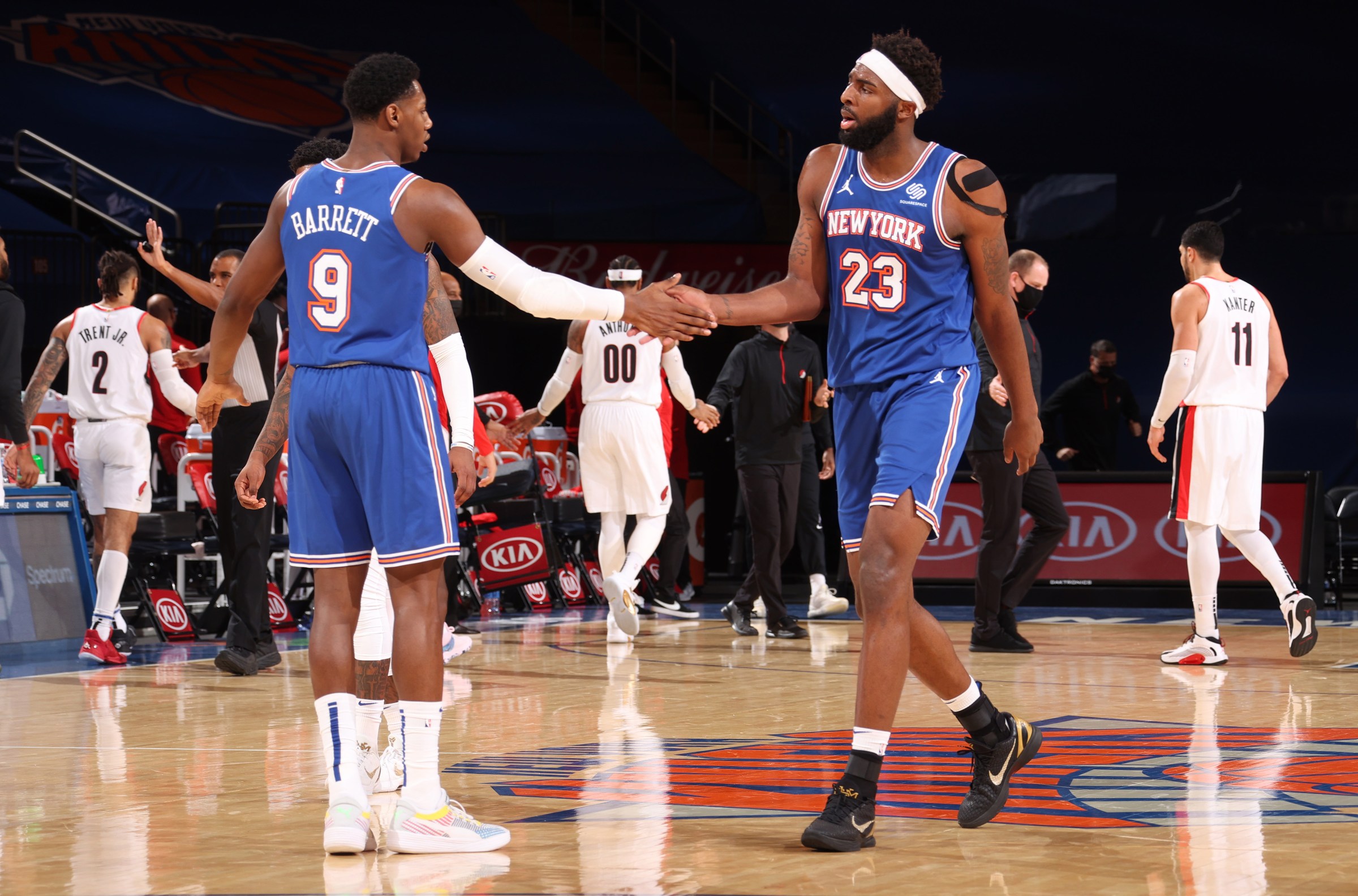 NEW YORK, NY - FEBRUARY 6: RJ Barrett #9 and Mitchell Robinson #23 of the New York Knicks hi-five during the game against the Portland Trail Blazers on February 6, 2021 at Madison Square Garden in New York City, New York. NOTE TO USER: User expressly acknowledges and agrees that, by downloading and or using this photograph, User is consenting to the terms and conditions of the Getty Images License Agreement. Mandatory Copyright Notice: Copyright 2021 NBAE (Photo by Nathaniel S. Butler/NBAE via Getty Images)