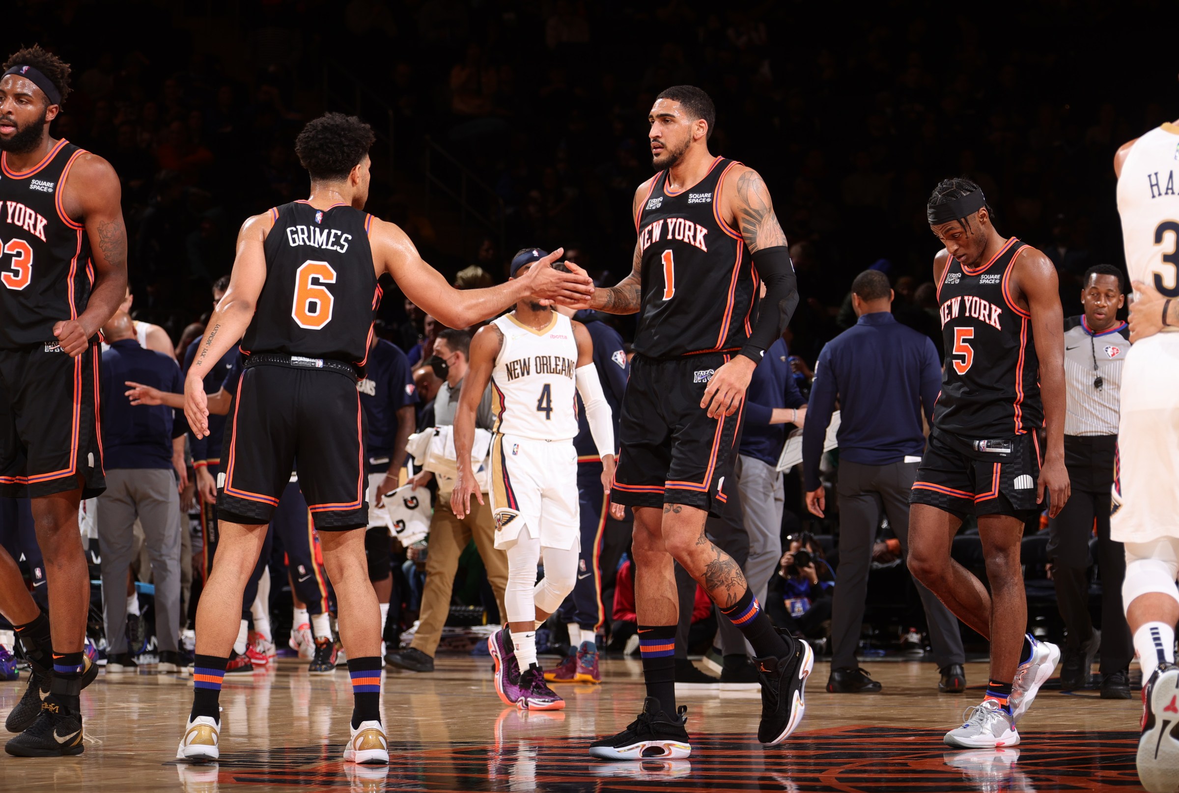 NEW YORK, NY - JANUARY 20: Quentin Grimes #6 and Obi Toppin #1 of the New York Knicks embrace during the game against the New Orleans Pelicans on January 20, 2022 at Madison Square Garden in New York City, New York. NOTE TO USER: User expressly acknowledges and agrees that, by downloading and or using this photograph, User is consenting to the terms and conditions of the Getty Images License Agreement. Mandatory Copyright Notice: Copyright 2022 NBAE (Photo by Nathaniel S. Butler/NBAE via Getty Images)
