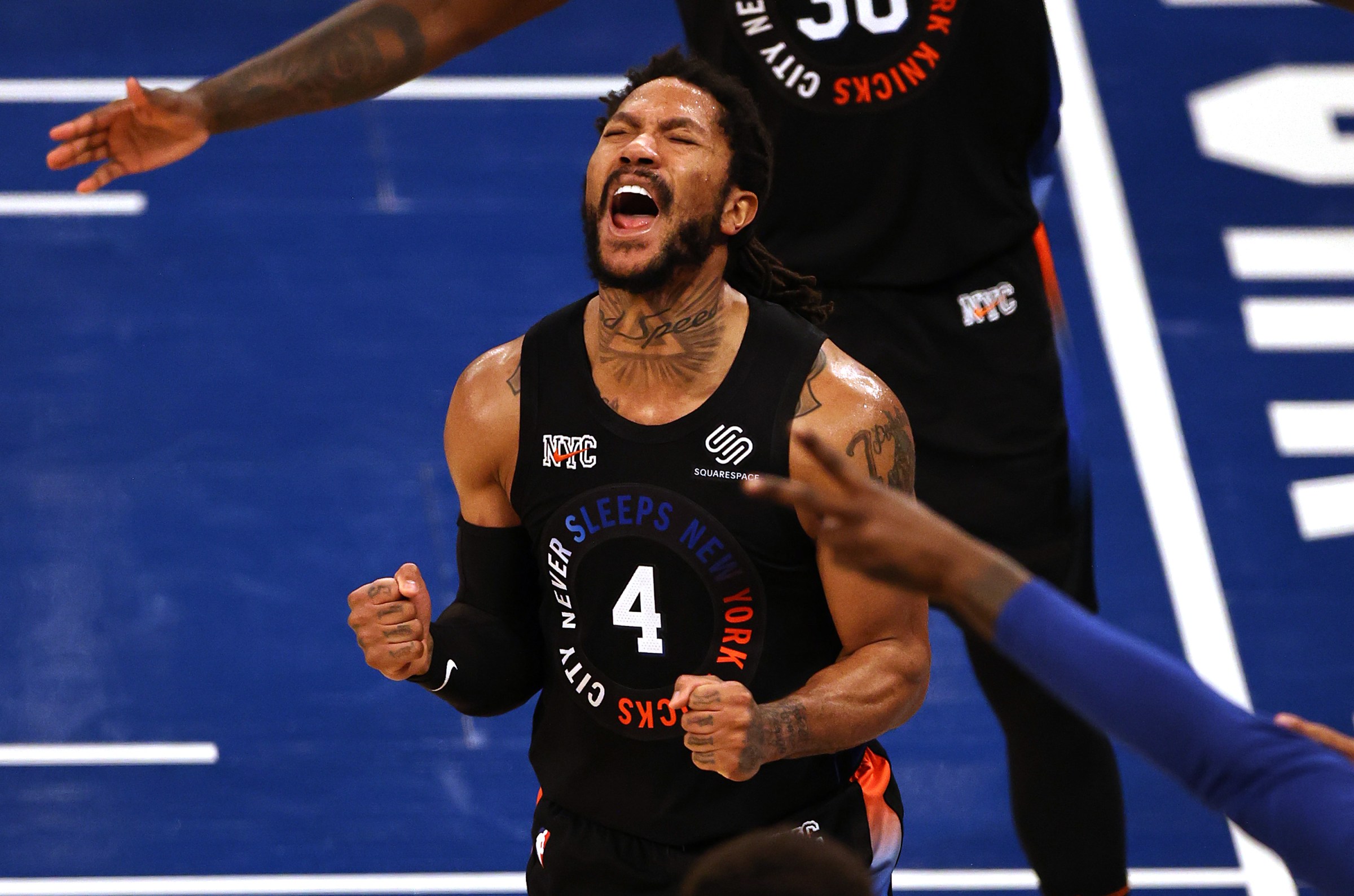 NEW YORK, NEW YORK - MAY 26: Derrick Rose #4 of the New York Knicks celebrates late in the fourth quarter against the Atlanta Hawks during game two of the Eastern Conference Quarterfinals at Madison Square Garden on May 26, 2021 in New York City.The New York Knicks defeated the Atlanta Hawks 101-92. NOTE TO USER: User expressly acknowledges and agrees that, by downloading and or using this photograph, User is consenting to the terms and conditions of the Getty Images License Agreement. (Photo by Elsa/Getty Images)