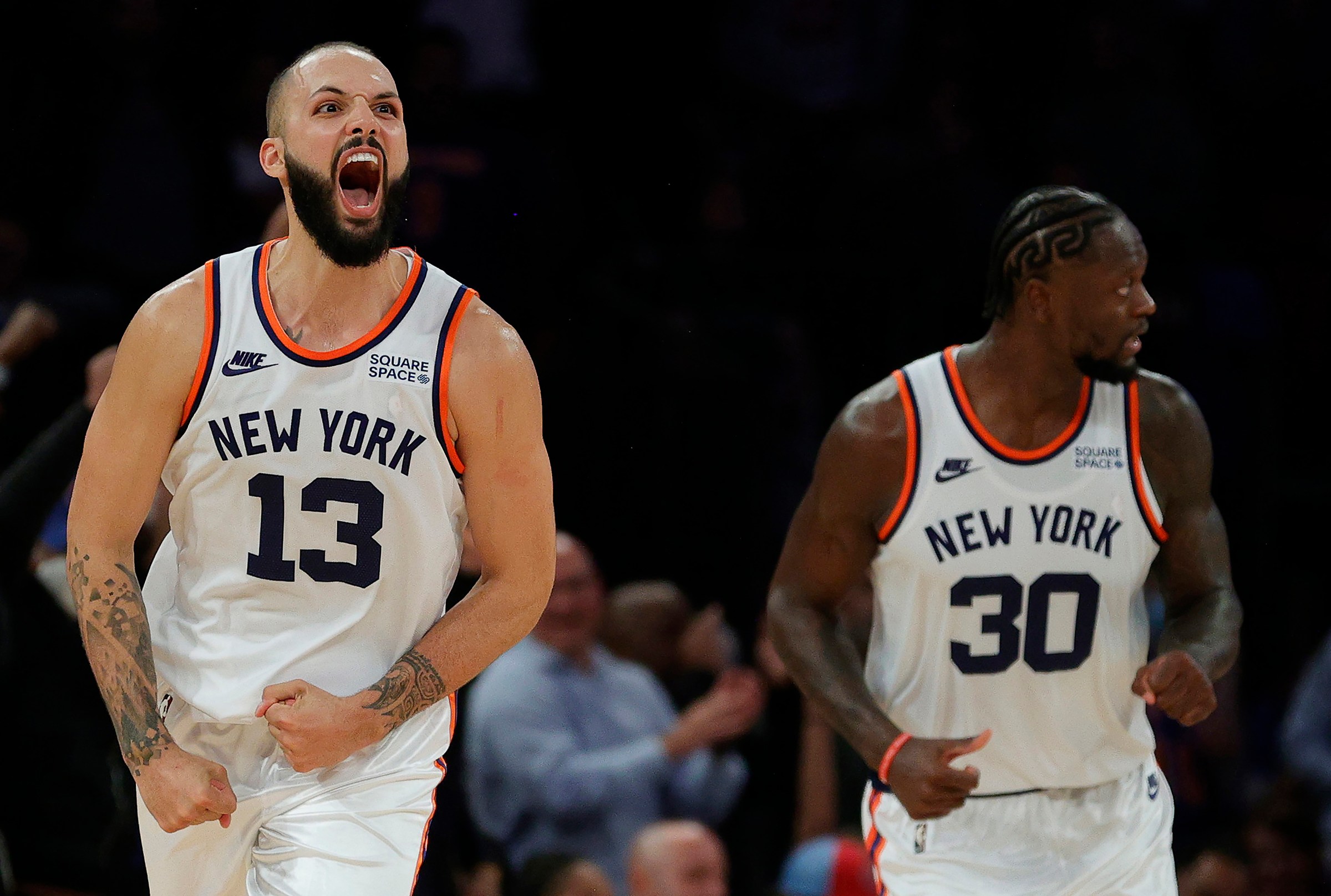 NEW YORK, NEW YORK - OCTOBER 20: Evan Fournier #13 of the New York Knicks reacts after making a three-point basket during second overtime against the Boston Celtics at Madison Square Garden on October 20, 2021 in New York City. The Knicks won 138-134. NOTE TO USER: User expressly acknowledges and agrees that, by downloading and or using this photograph, User is consenting to the terms and conditions of the Getty Images License Agreement. (Photo by Sarah Stier/Getty Images)