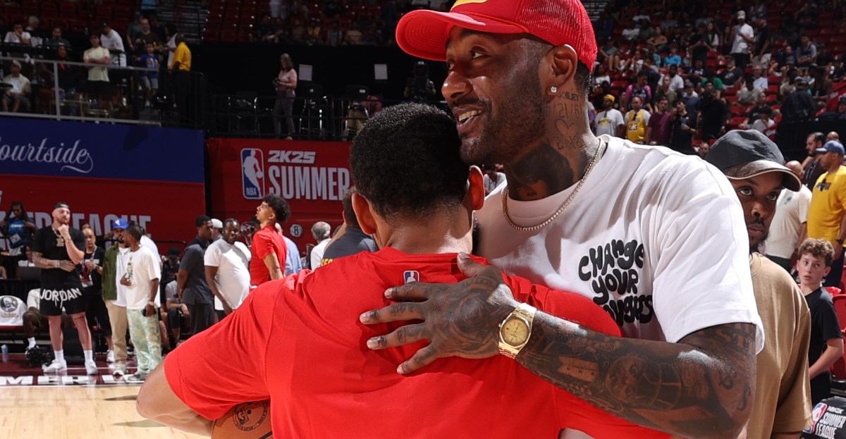 John Wall reacts to whether his Wizards jersey number would be retired