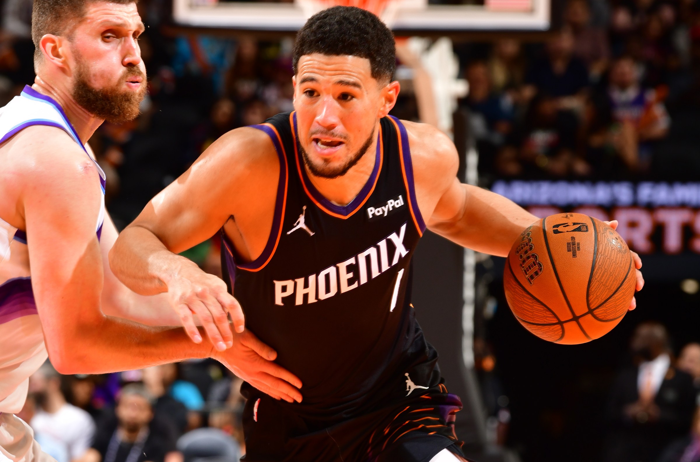 PHOENIX, AZ - OCTOBER 31: Devin Booker #1 of the Phoenix Suns dribbles the ball during the game against the Utah Jazz on October 31, 2025 at PHX Arena in Phoenix, Arizona. NOTE TO USER: User expressly acknowledges and agrees that, by downloading and or using this photograph, user is consenting to the terms and conditions of the Getty Images License Agreement. Mandatory Copyright Notice: Copyright 2025 NBAE (Photo by Barry Gossage/NBAE via Getty Images)