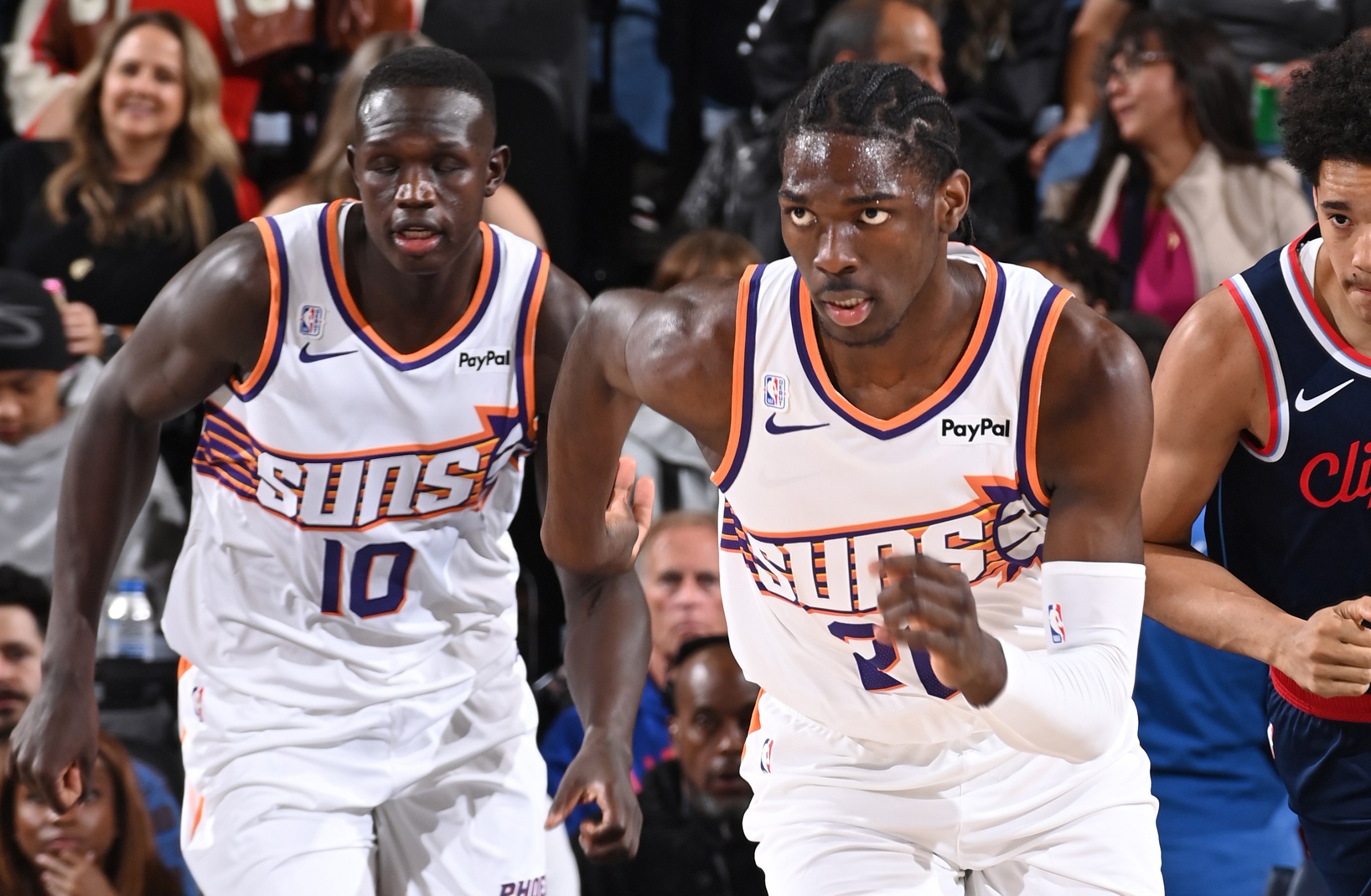 INGLEWOOD, CA - OCTOBER 24: Khaman Maluach #10, Rasheer Fleming #20 of the Phoenix Suns and Yanic Konan Niederhäuser #14 of the LA Clippers looks on during the game on October 24, 2025 at Intuit Dome in Los Angeles, California. NOTE TO USER: User expressly acknowledges and agrees that, by downloading and/or using this Photograph, user is consenting to the terms and conditions of the Getty Images License Agreement. Mandatory Copyright Notice: Copyright 2025 NBAE (Photo by Juan Ocampo/NBAE via Getty Images)