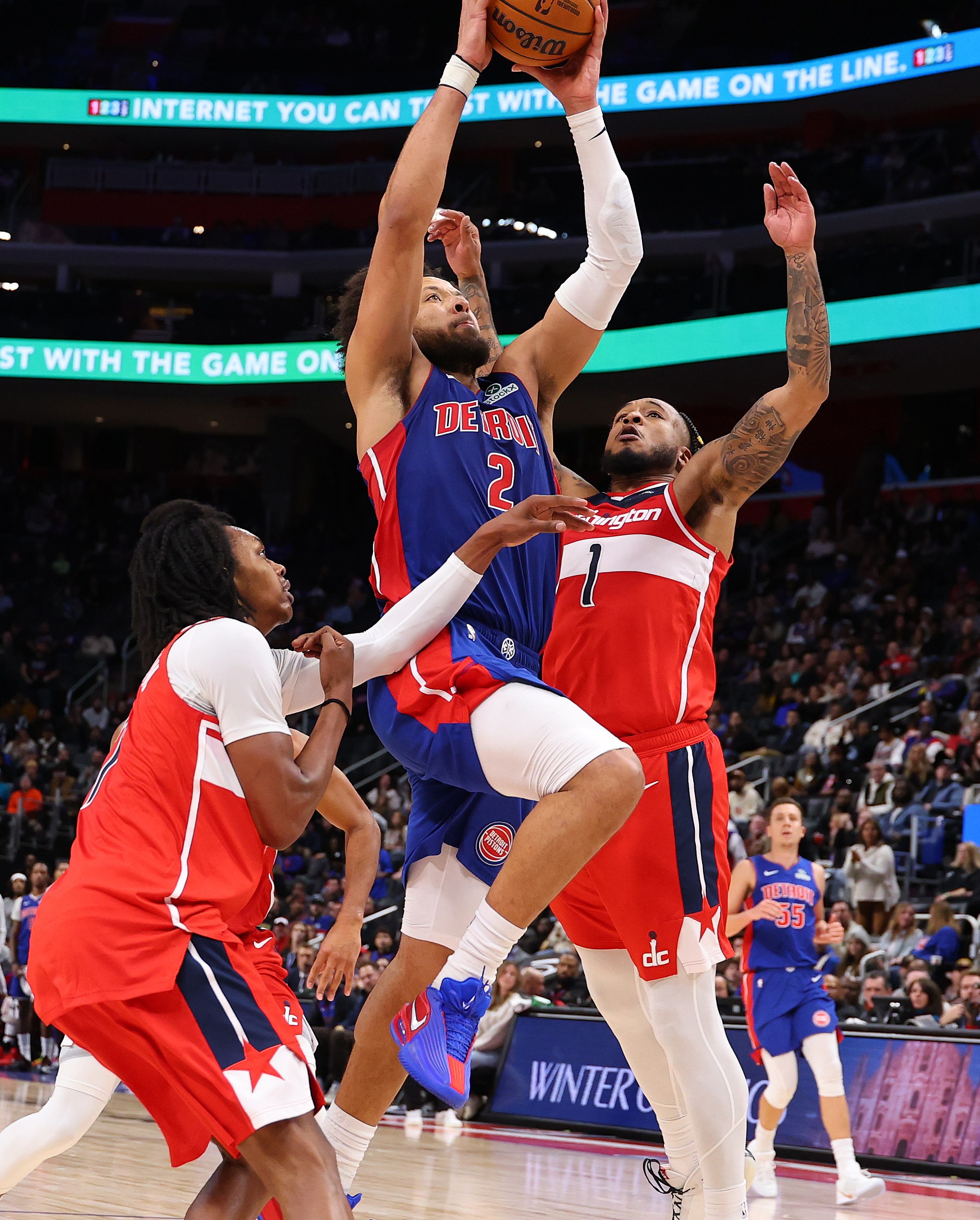 Washington Wizards forward Cam Whitmore going for a block against Detroit Pistons guard Cade Cunningham.