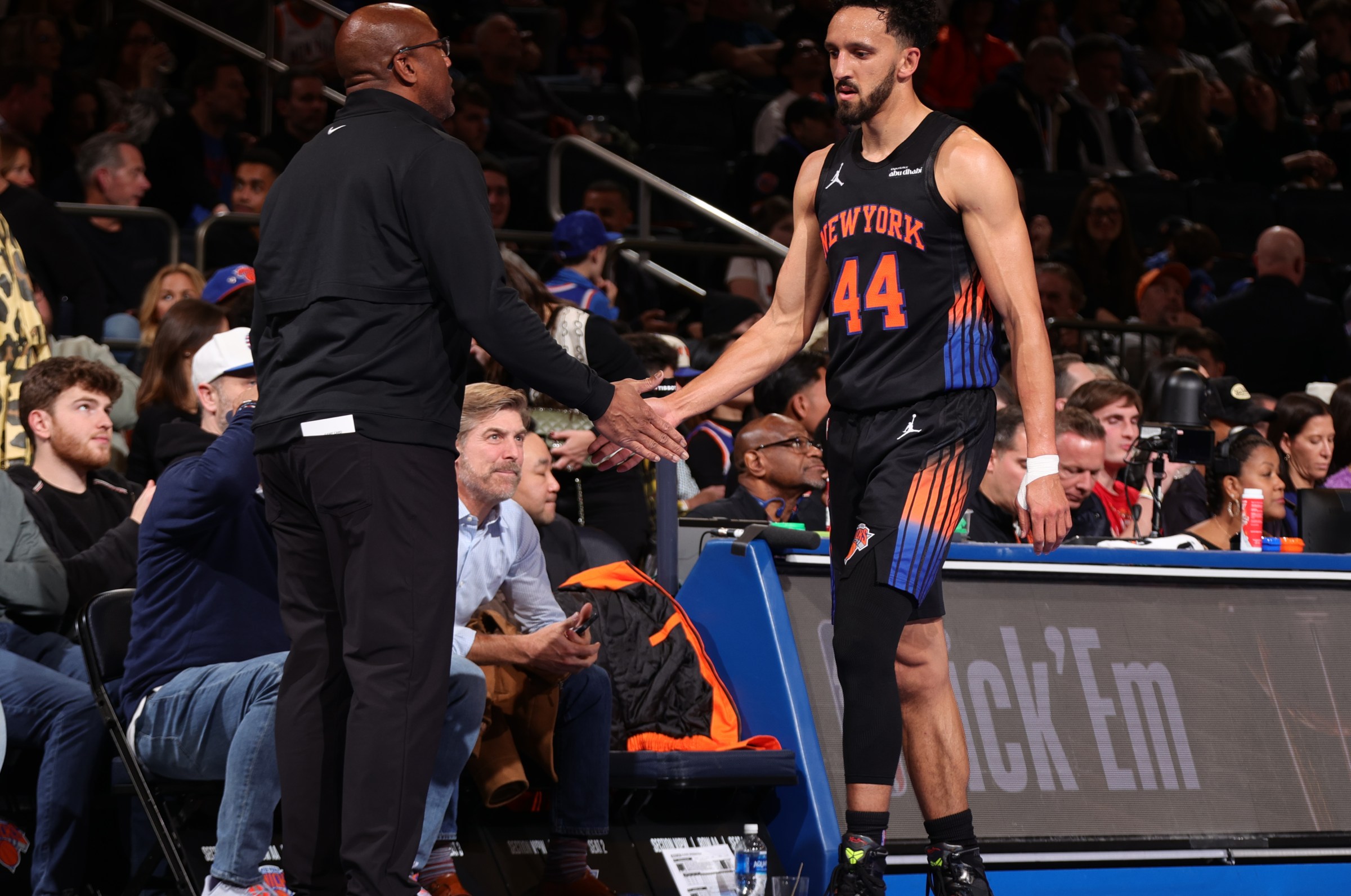 NEW YORK, NY - NOVEMBER 14: Head Coach Tom Thibodeau and Landry Shamet #44 of the New York Knicks high five during the game against the Miami Heat during the 2025 - 2026 Emirates NBA Cup game on November 14, 2025 at Madison Square Garden in New York City, New York. NOTE TO USER: User expressly acknowledges and agrees that, by downloading and or using this photograph, User is consenting to the terms and conditions of the Getty Images License Agreement. Mandatory Copyright Notice: Copyright 2025 NBAE (Photo by Nathaniel S. Butler/NBAE via Getty Images)