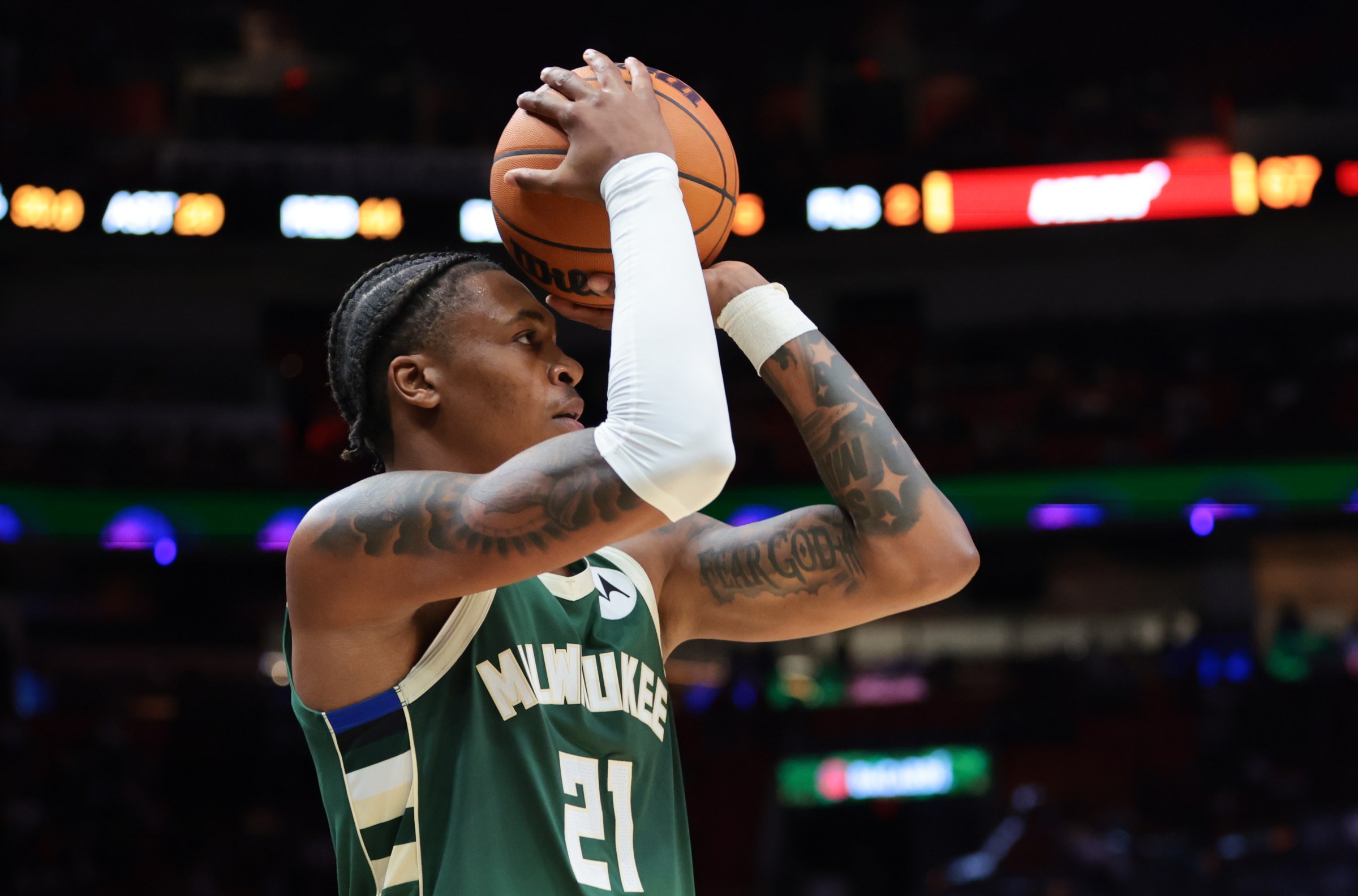 Oct 6, 2025; Miami, Florida, USA; Milwaukee Bucks forward Tyler Smith (21) shoots the basketball against the Miami Heat during the third quarter at Kaseya Center. Mandatory Credit: Sam Navarro-Imagn Images
