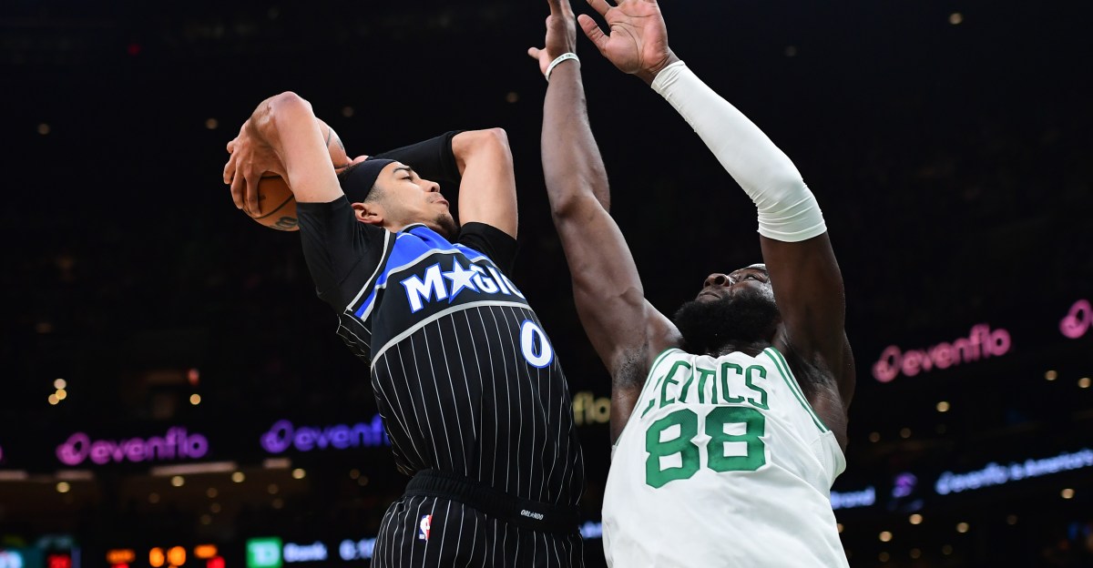 Celtics hold off late comeback, beat Magic 138-129
