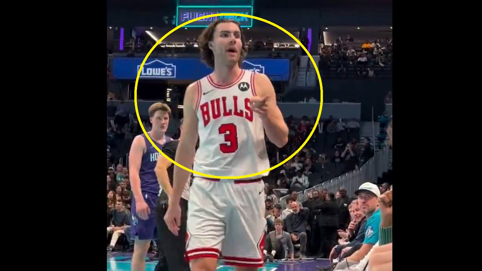 Josh Giddey pointing at a fan