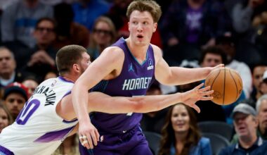 Charlotte Hornets guard Kon Knueppel, right, looks to pass against Utah Jazz guard Svi Mykhailiuk during the first half of an NBA basketball game in Charlotte, N.C., Sunday, Nov. 2, 2025. (AP Photo/Nell Redmond)