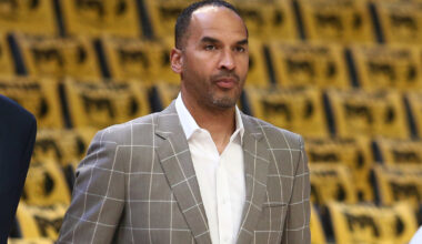 Mavericks GM Nico Harrison in a suit