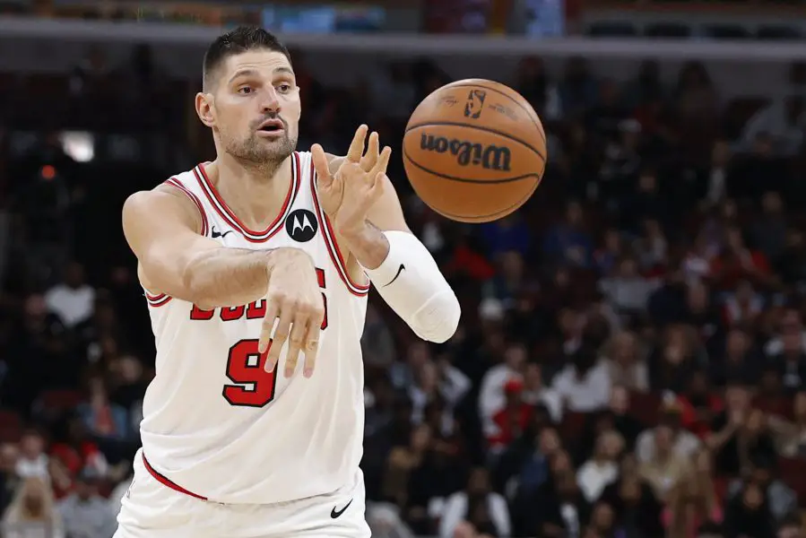 Nov 22, 2025; Chicago, Illinois, USA; Chicago Bulls center Nikola Vucevic (9) passes the ball against the Washington Wizards during the first half at United Center. Mandatory Credit: Kamil Krzaczynski-Imagn Images