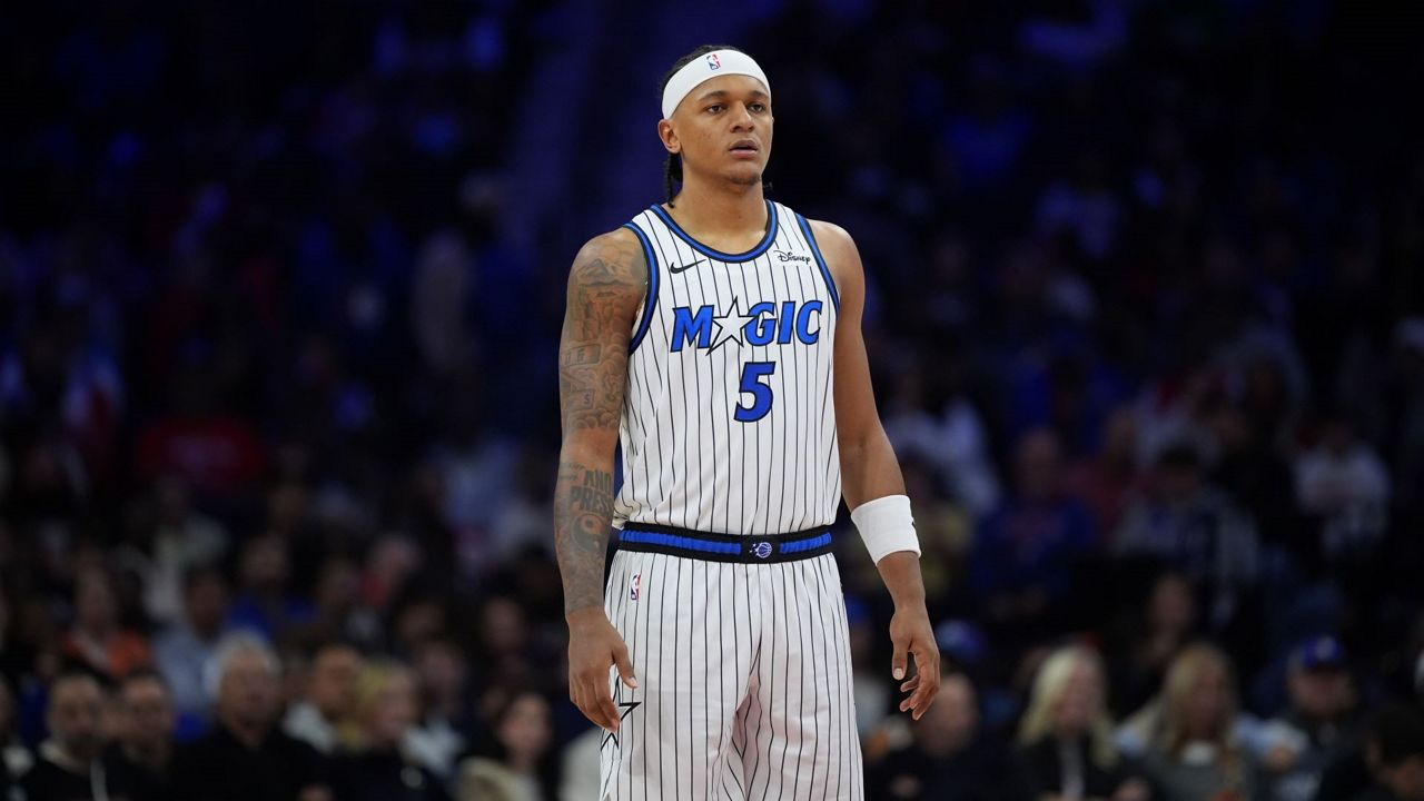 Forward Paolo Banchero will not be on the court Friday when the Magic face the New Jersey Nets in an NBA Cup game because of a strained left groin. (AP Photo/Matt Slocum)